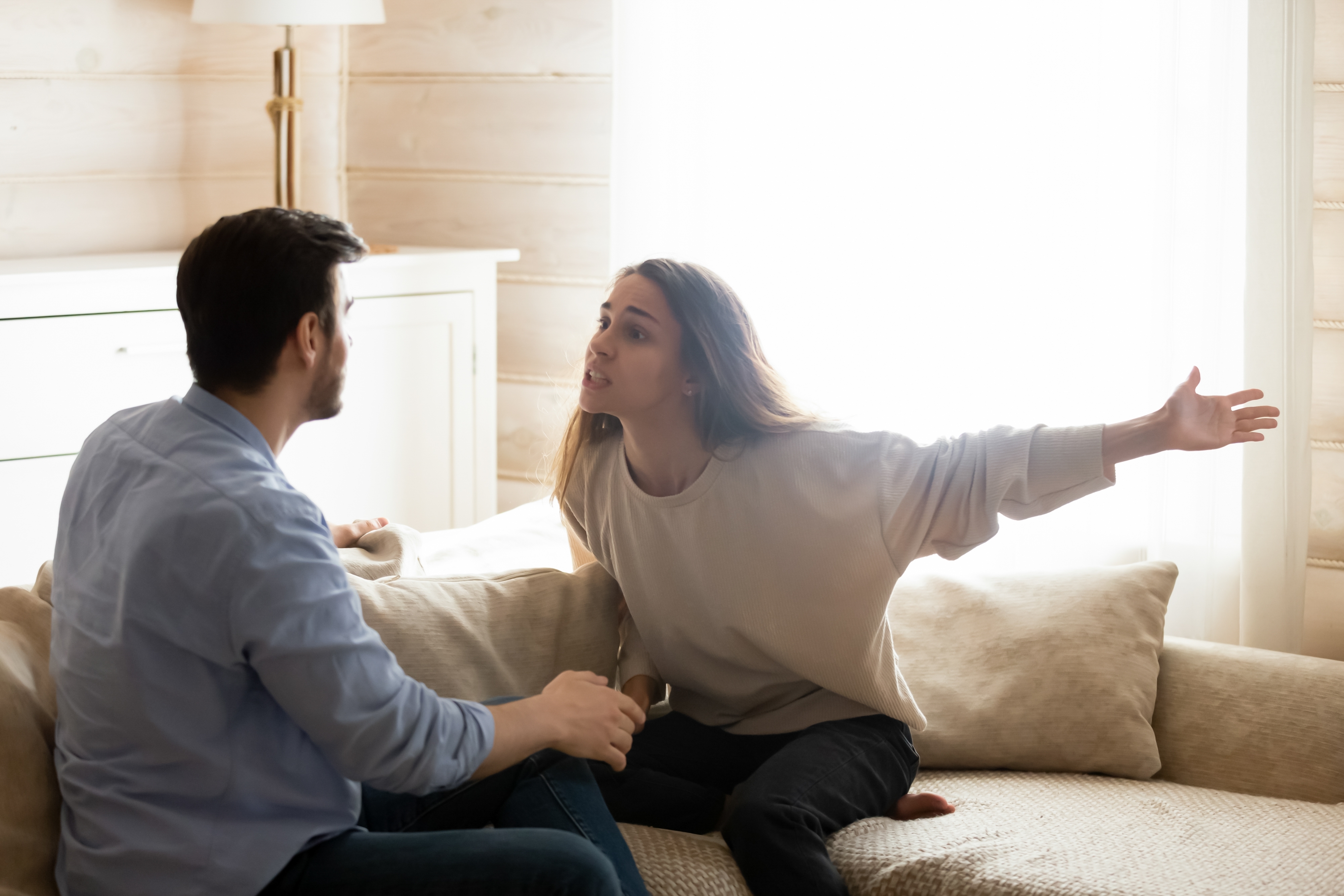 Couple arguing at home | Source: Shutterstock