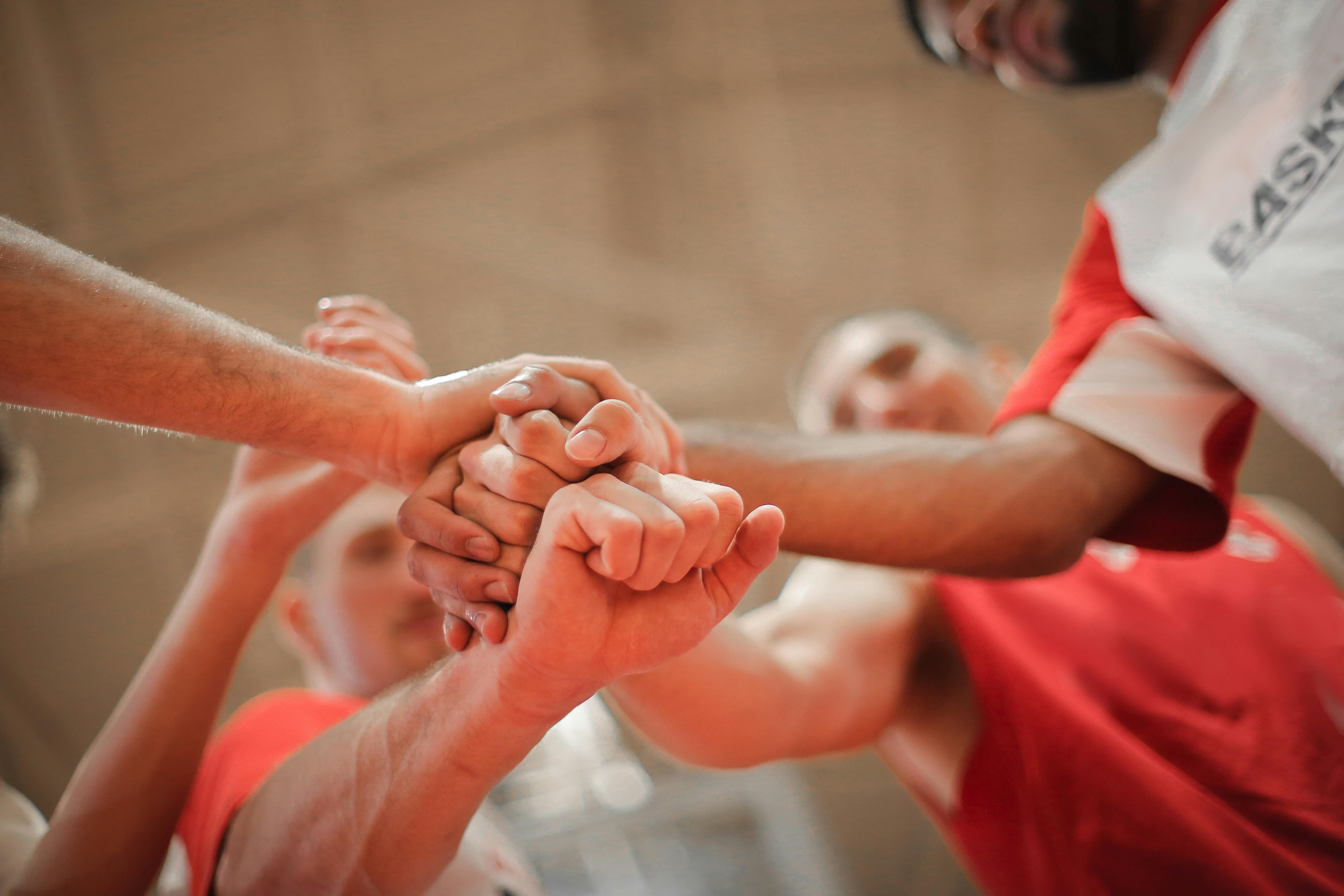 People clenching their fists | Source: Pexels