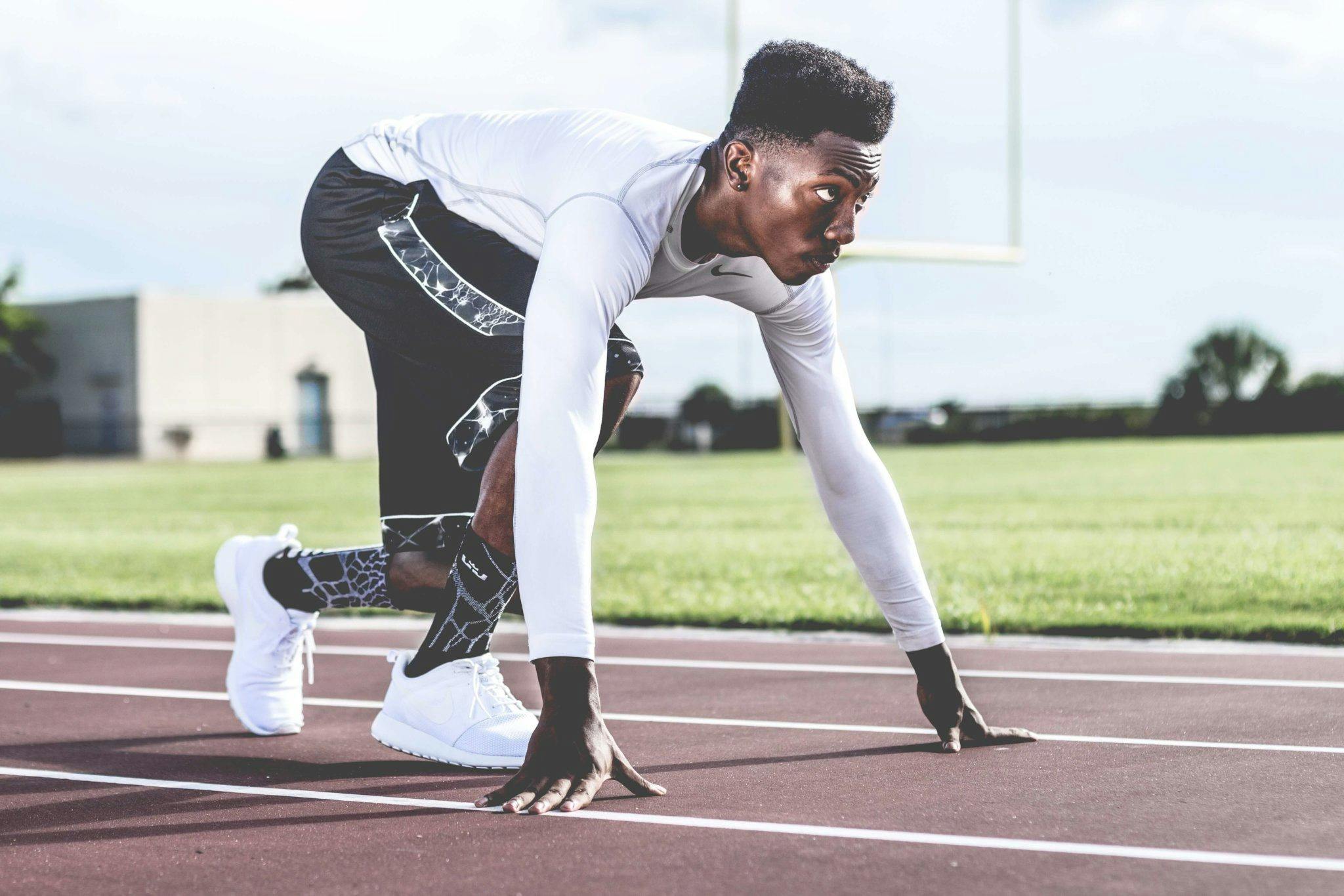 Man on a running track | Source: Pexels